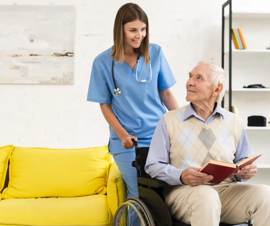 old-man-sitting-wheelchair-while-talking-nurse copy